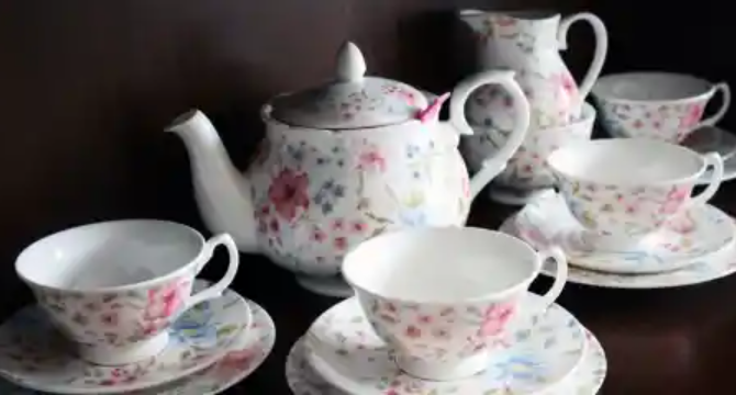 Grandma Dropped Her Vintage Tea Set the Moment She Saw My Fiancé’s Blue Eyes – Then She Showed Me His Face in a 1950s Photo Album